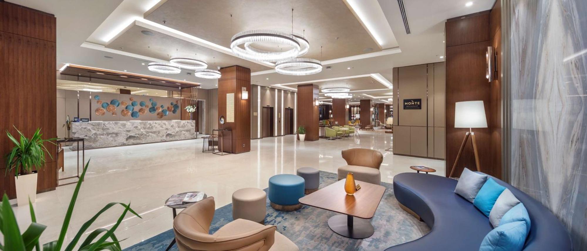 فندق دبل تري باي هيلتون سكوب سكوبجي المظهر الخارجي الصورة Lobby
